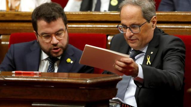 El presidente de la Generalitat, Quim Torra (d), acompañado por el vicepresidente, Pere Aragonés, muy crítico con el discurso del jefe de la Guardia Civil en Cataluña / CG