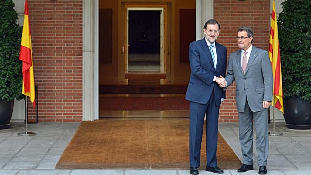 El presidente del Gobierno, Mariano Rajoy, y el de la Generalidad, Artur Mas, durante un encuentro de ambos en la Moncloa