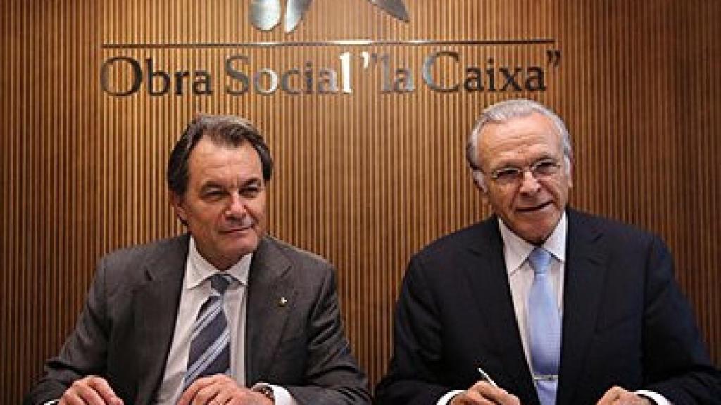 Artur Mas e Isidro Fainé en el momento de la firma