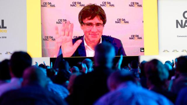 Imagen de Carles Puigdemont, 'expresident' catalán prófugo de la justicia, durante un acto de la Crida Nacional per la República / EFE