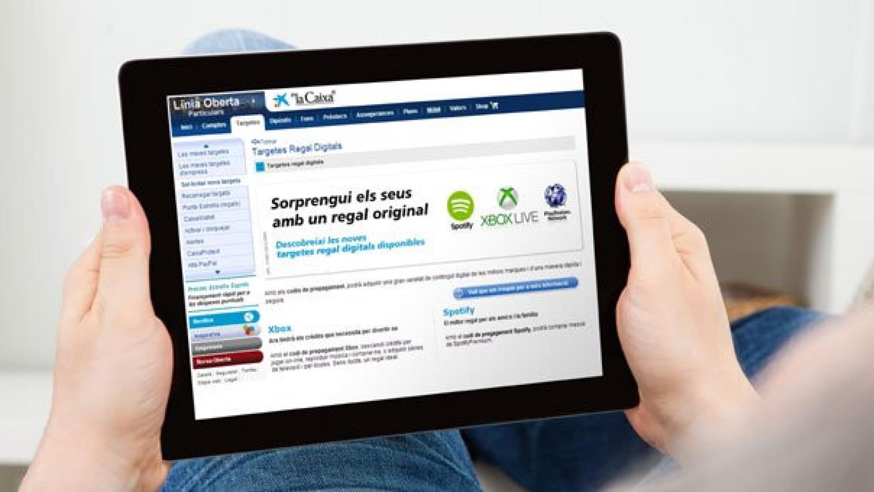 La Caixa distribuirá tarjetas prepago de Spotify, Xbox y PlayStation
