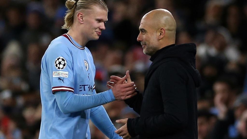 Erling Haaland y Pep Guardiola, tras el Manchester City-Leipzig / EFE
