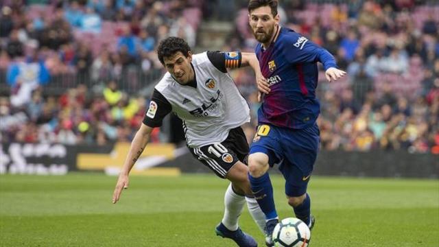 Una foto de archivo de Leo Messi y Dani Parejo durante un partido / EFE