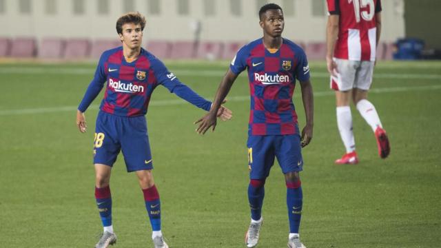 Ansu Fati y Riqui Puig, en un partido con el Barça | EFE
