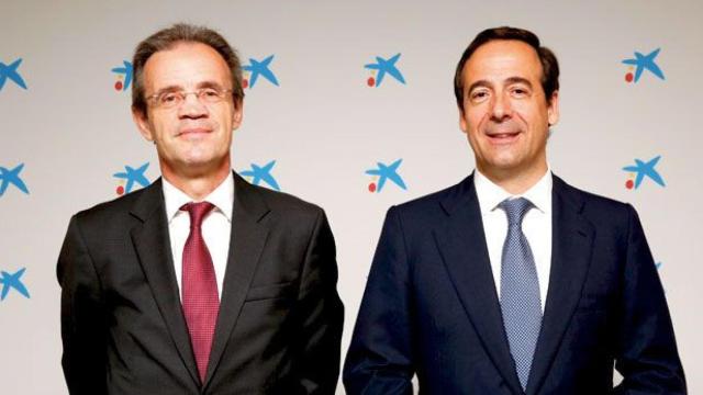 Jordi Gual, presidente de CaixaBank, y Gonzalo Gortázar, consejero delegado de la entidad en una imagen de archivo / CG