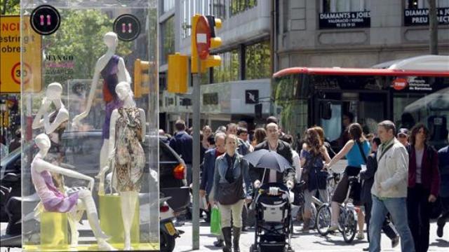 Imagen del Paseo de Gracia de Barcelona lleno de personas / CG