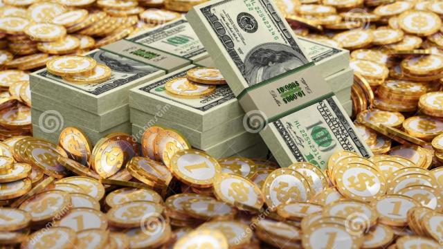 Billetes y monedas con el símbolo del dólar estadounidense