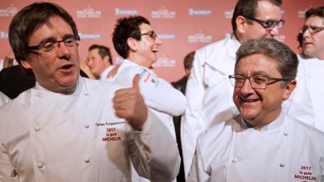 El presidente catalán, Carles Puigdemont, y el delegado del Gobierno en Cataluña, Enric Millo, durante la gala Michelin / EFE