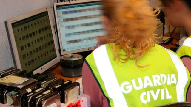 Dos investigadores de la Guardia Civil / CG