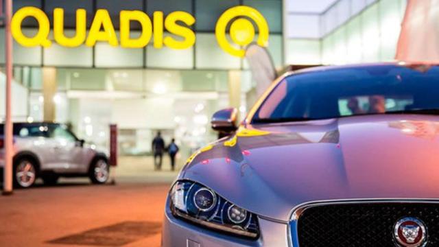 Un coche delante de un concesionario Quadis, en una imagen de archivo / CG