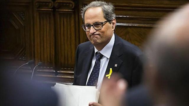 Quim Torra, con gesto apesadumbrado, en el Parlament / EFE