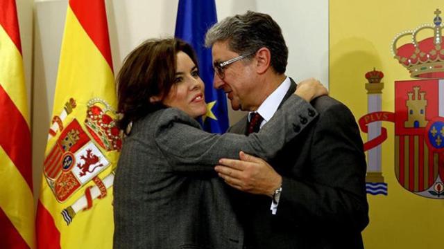 La vicepresidenta española Soraya Sáenz de Santamaría y el delegado del Gobierno en Cataluña, Enric Millo / EFE