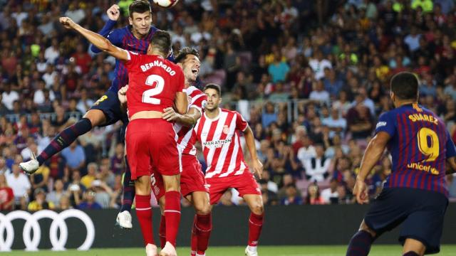 Gerad Piqué en una acción del partido de liga del Barça contra el Girona / EFE