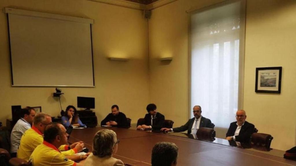 El consejero de Interior, Miquel Buch, durante la reunión de seguridad en la que se ha decidido cerrar espacios comerciales y locales de ocio en Cataluña / INTERIOR