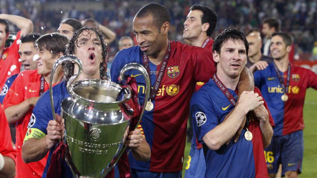 Carles Puyol, Thierry Henry i Leo Messi aixequen la Champions de 2009