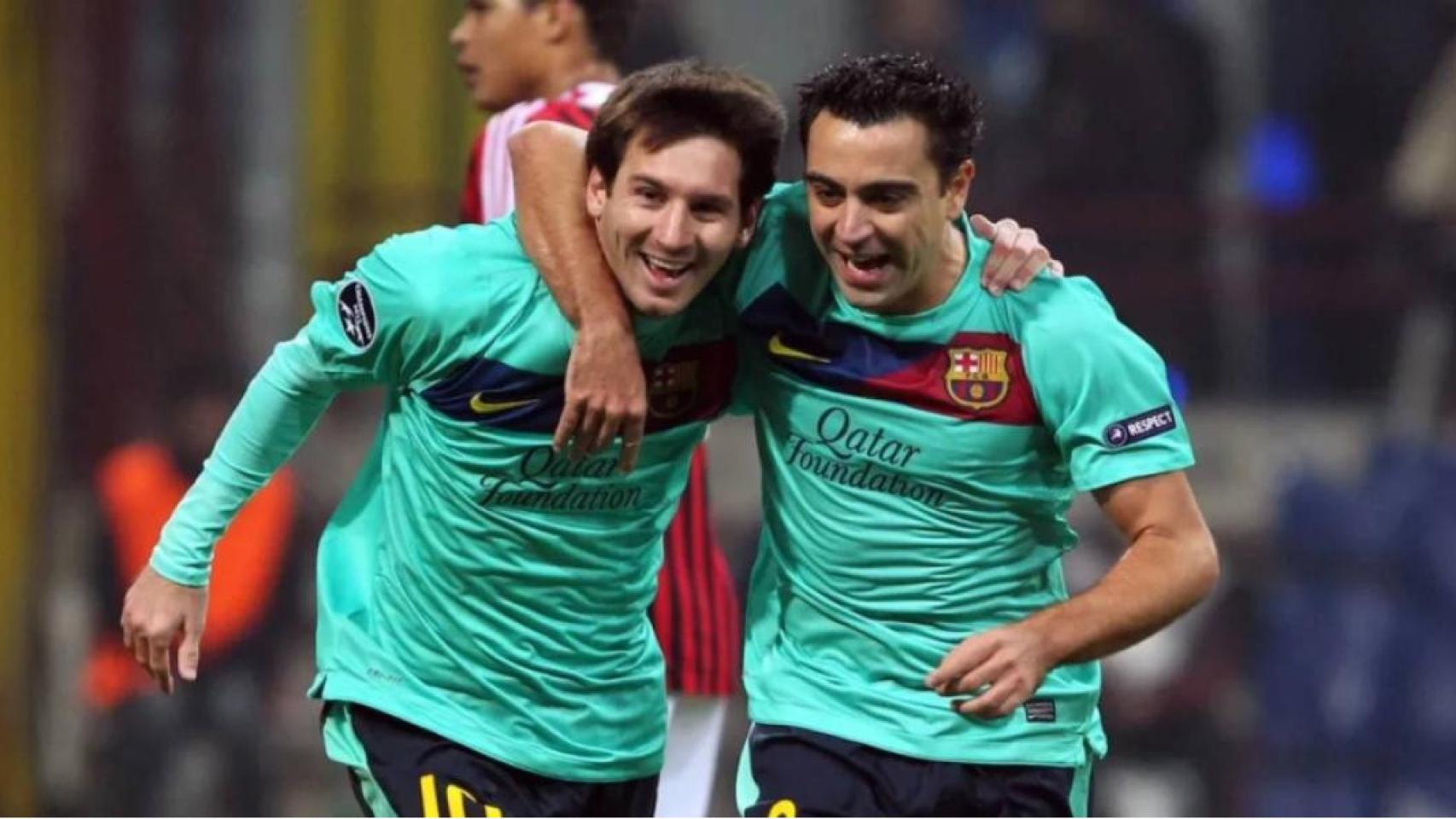 Messi y Xavi celebrando un gol con el Barça