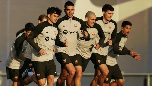Los jugadores del FC Barcelona, durante una sesión de entrenamiento