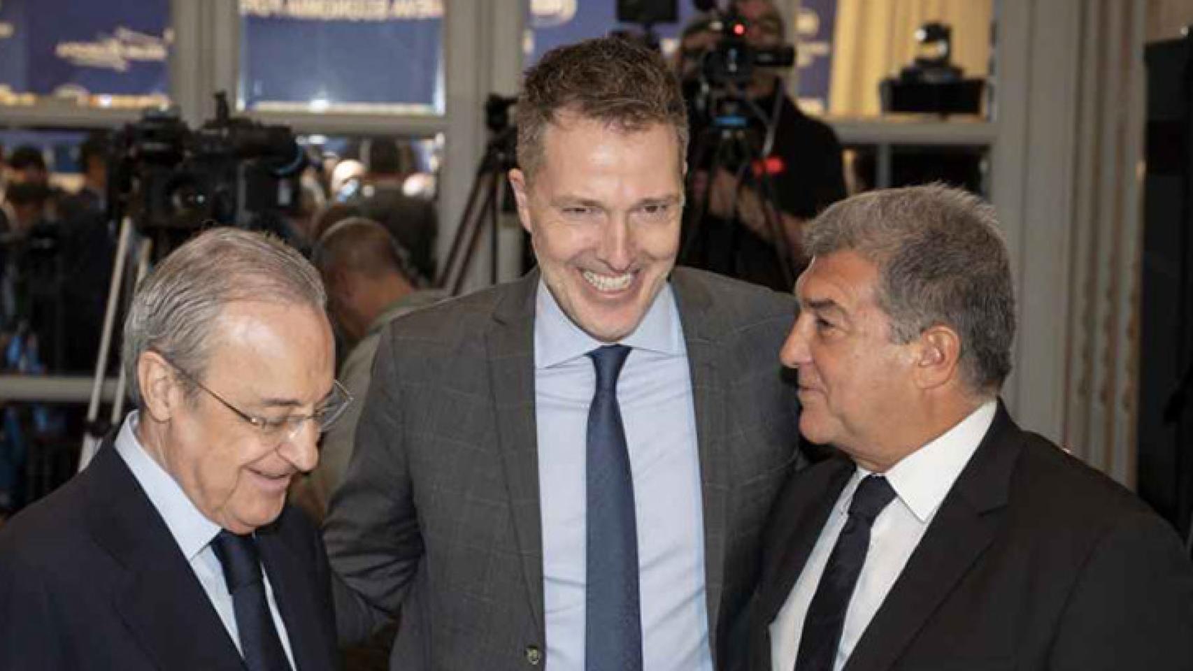 Joan Laporta y Florentino Pérez, junto a Bernd Reichart, CEO de A22 Sport