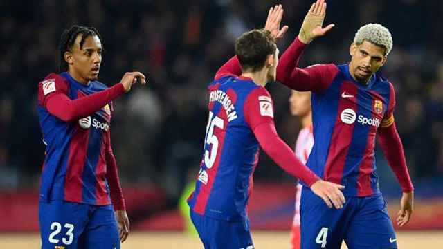 Christensen y Araujo, celebrando una acción defensiva