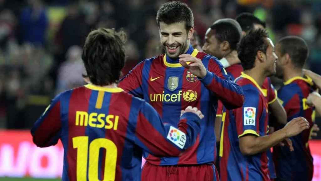 Leo Messi i Gerard Piqué, en un partit del Barça de la temporada 2010-11