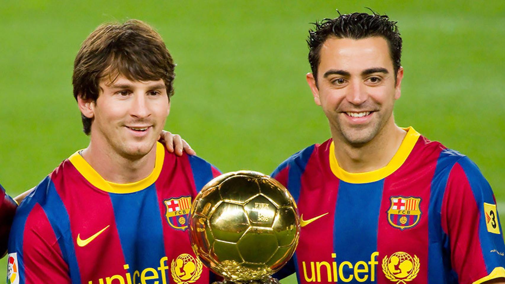 Iniesta, Messi y Xavi, con el Balón de Oro de 2010