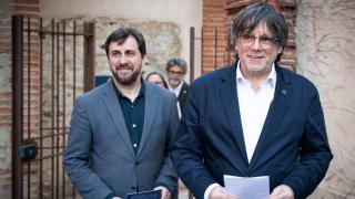 El eurodiputado Toni Comín y el expresidente de la Generalitat y candidato de Junts al 12 de mayo, Carles Puigdemont