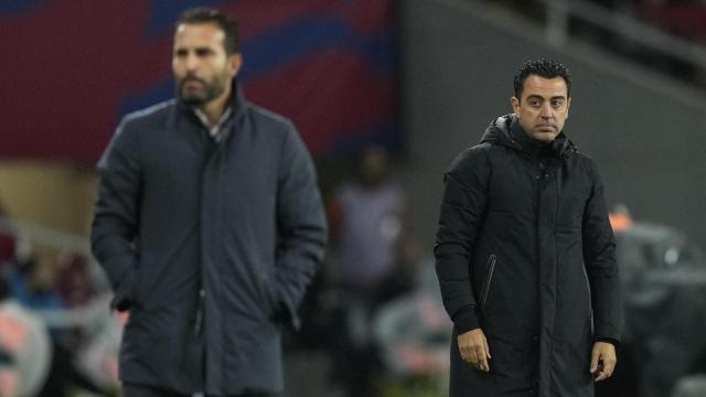 Xavi Hernández y Rubén Baraja, en Montjuïc