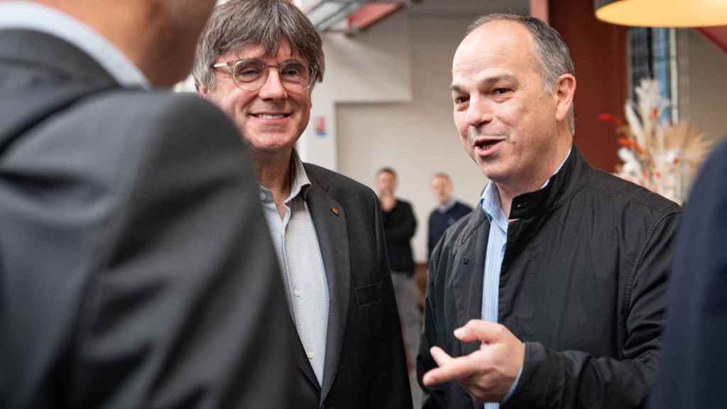 El candidato de Junts, Carles Puigdemont, y el secretario general del partido, Jordi Turull