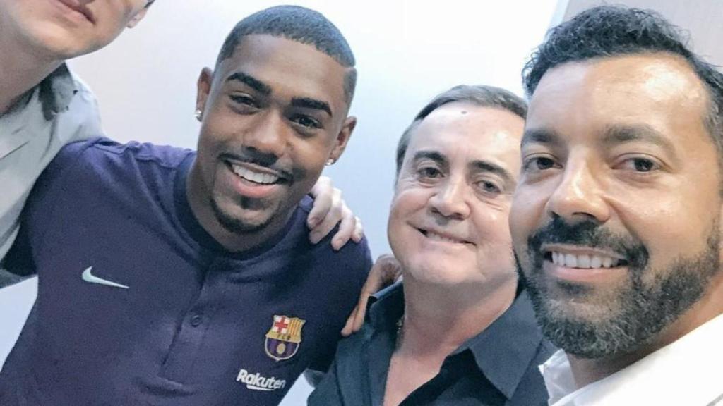 Malcom al costat de Júnior Minguella