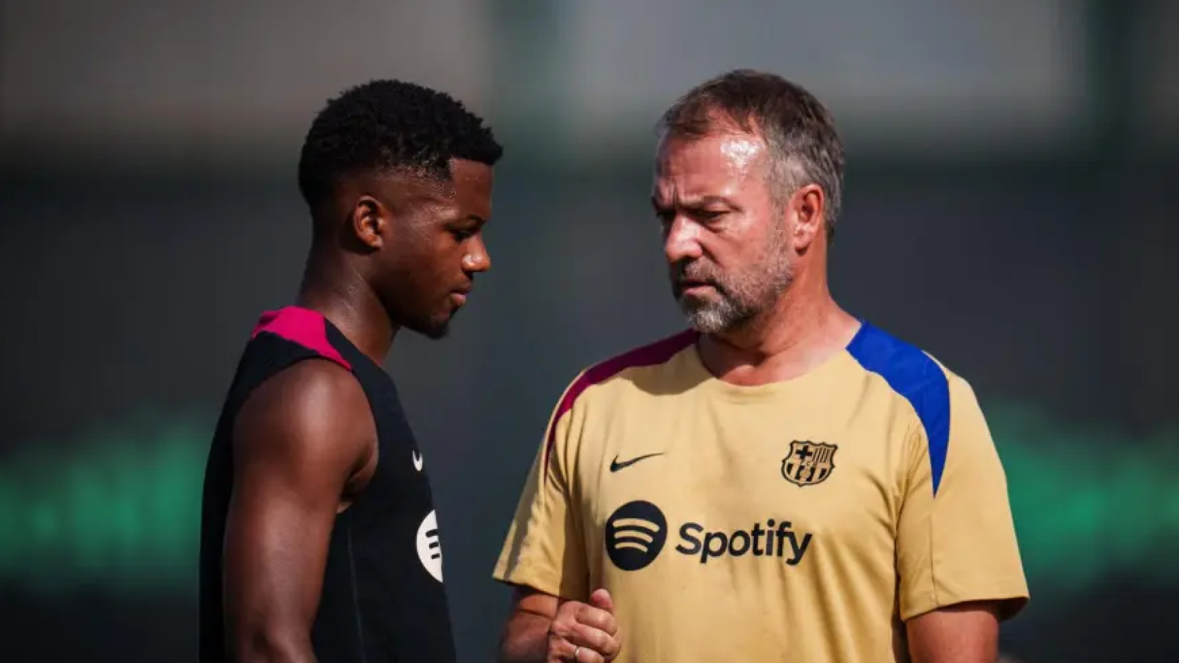 Hansi Flick charla con Ansu Fati