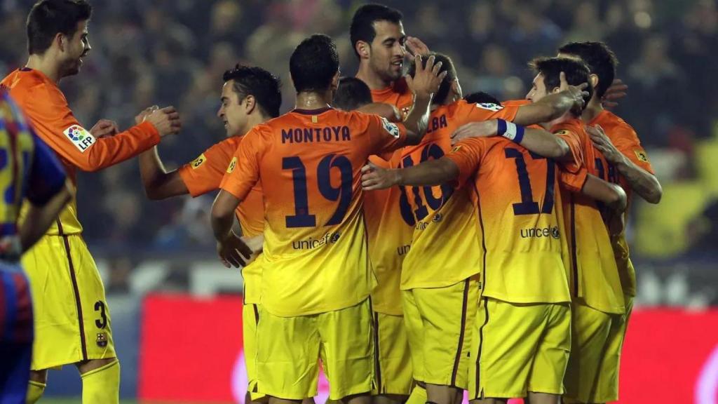 Los jugadores del Barça celebran un gol ante el Levante en 2012