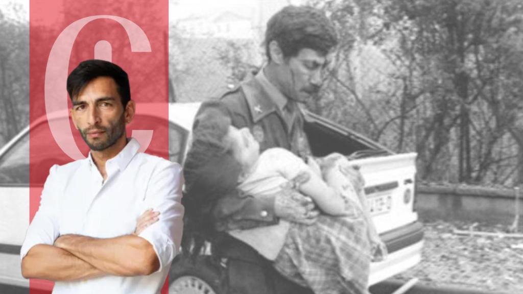 Un guardia civil lleva en brazo a una niña tras el atentado de ETA en el cuartel de Vic