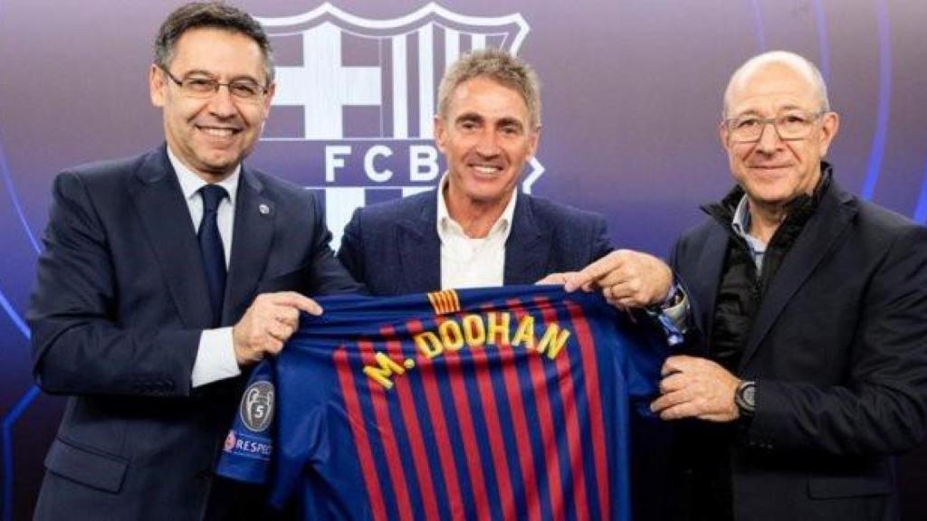 Josep Maria Bartomeu y Manel Arroyo, con Mick Doohan, pentacampeón del mundo de motociclismo