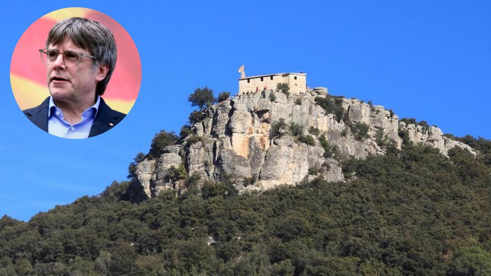 Vista contrapicada de Amer con una foto de Carles Puigdemont