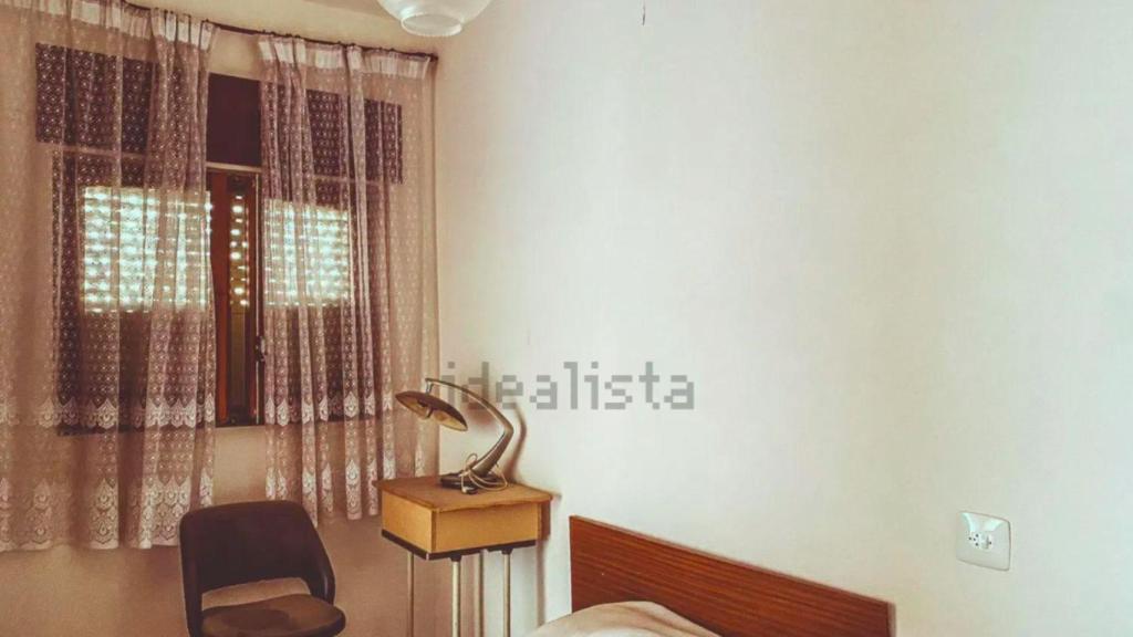 Dormitorio de una casa en venta