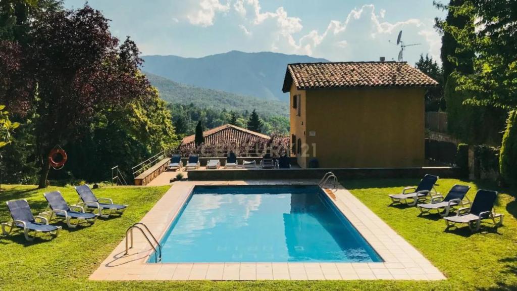 El jardí amb piscina de l'Hotel La Glòria