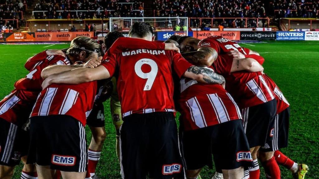 Los jugadores del Exeter City, en el partido contra el Lincoln City en St James Park