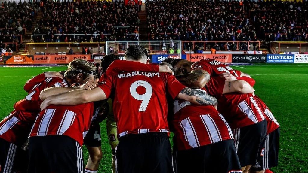 Els jugadors de l'Exeter City, en el partit contra el Lincoln City a St James Park