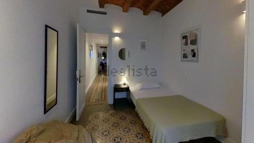 Una de les habitacions que ofereix New Amsterdam Developers (New Nomad) al número 14 del carrer de Sant Agustí de Barcelona