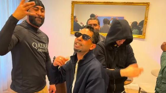 Mounir Nasraoui con el rapero La Fouine