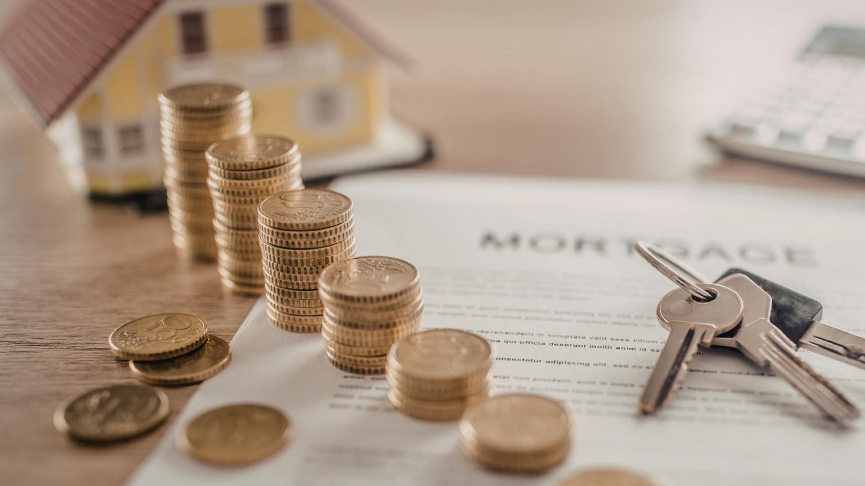 Casa, monedas y llaves