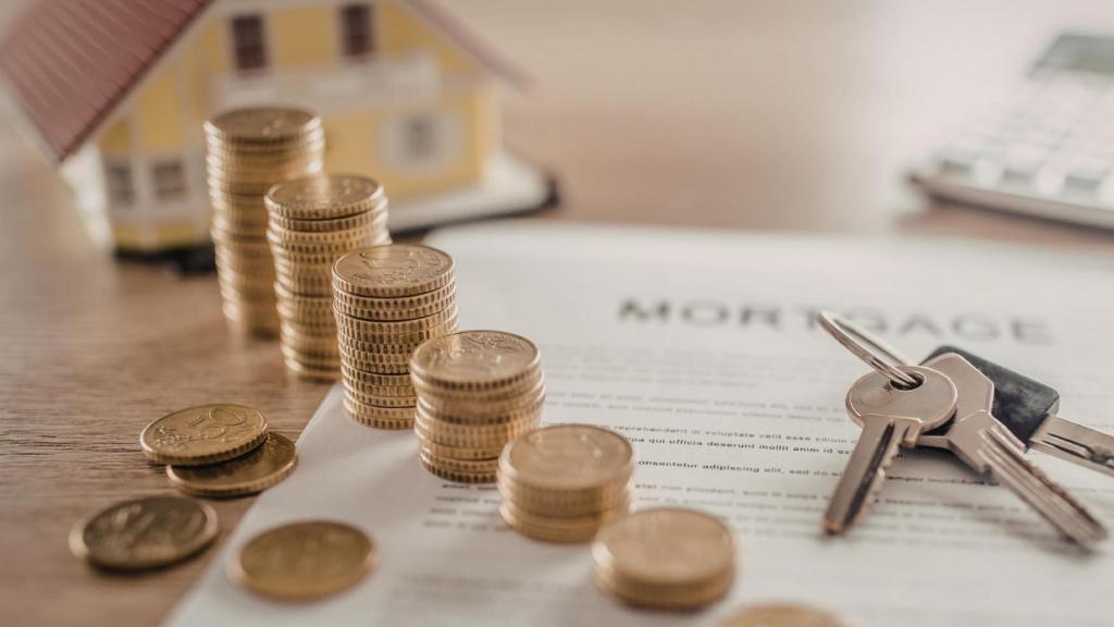 Casa, monedas y llaves