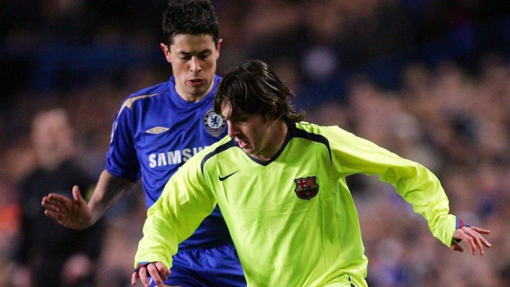 Del Horno, junto a Leo Messi.