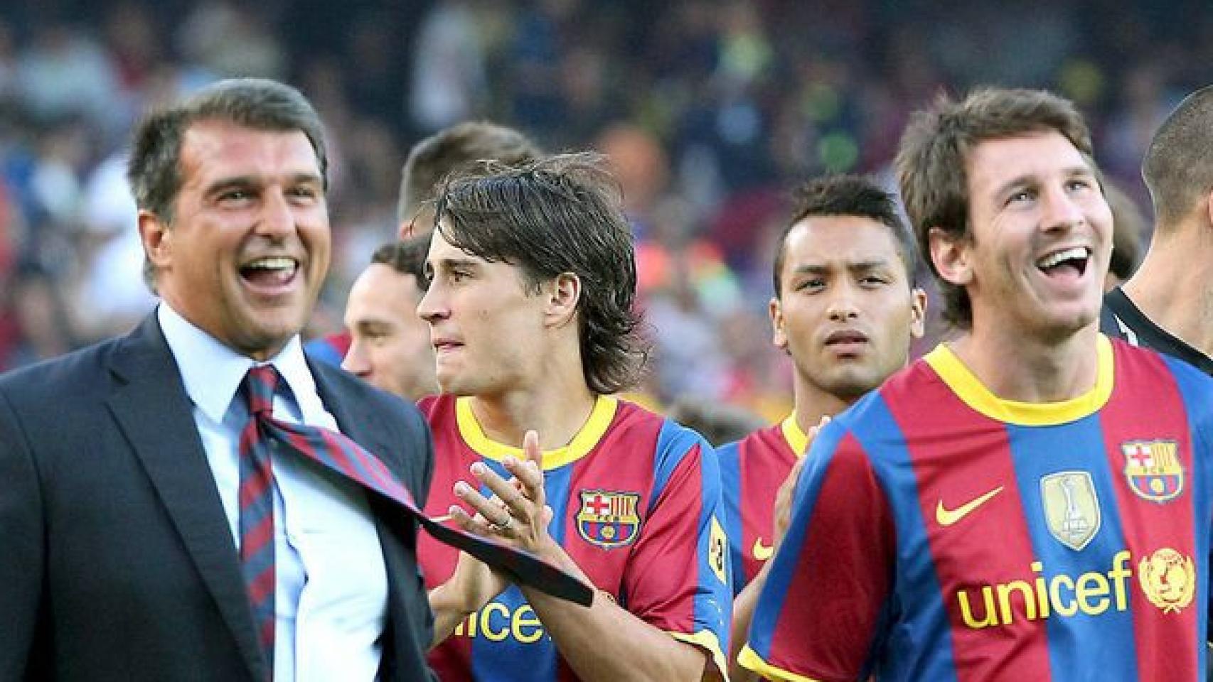 Messi y Joan Laporta celebran un título del Barça