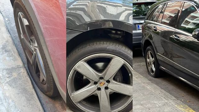 Coches con las ruedas deshinchadas en Sarrià / TWITTER
