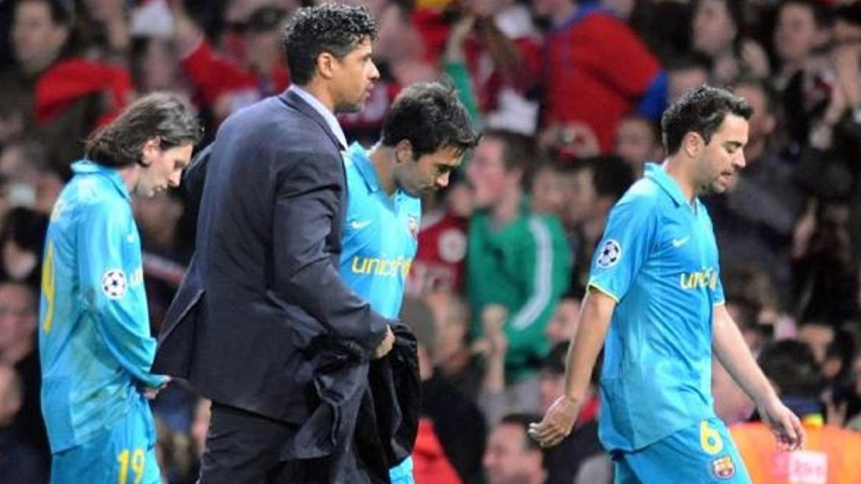 Rijkaard, con Deco y Xavi