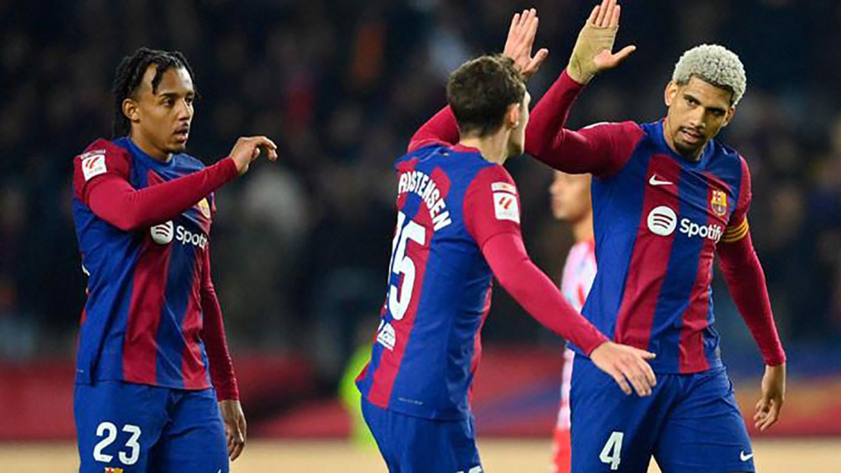 Christensen y Araujo, celebrando una acción defensiva