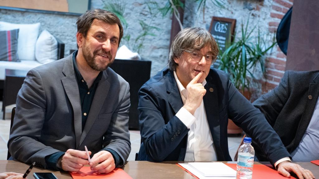 Toni Comín (i) y  Carles Puigdemont (d)