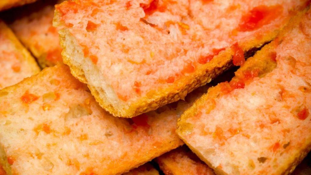 Pan con tomate | CANVA