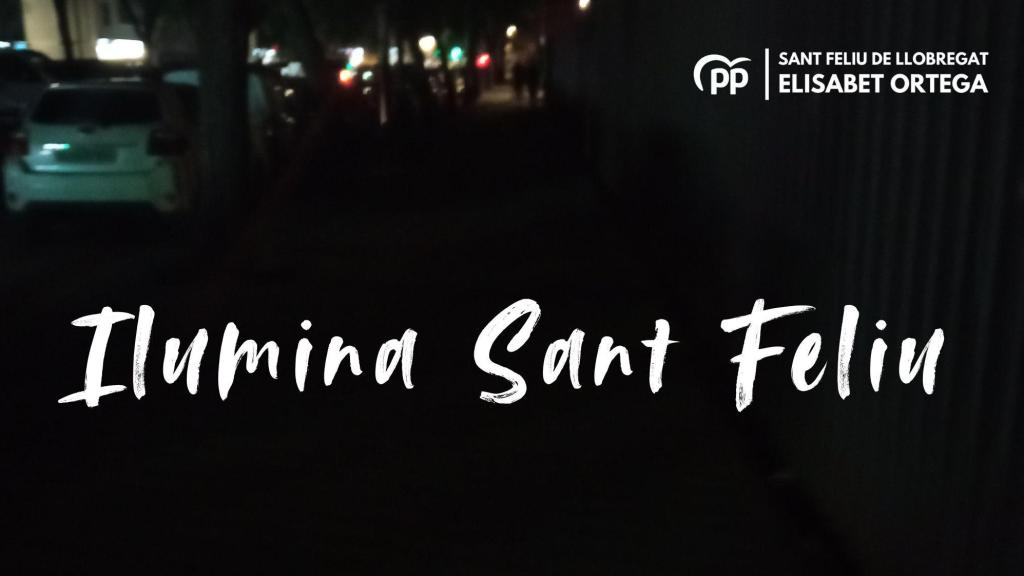 Imatge promocional de la campanya, amb la imatge d'un carrer de Sant Feliu amb escassa il·luminació